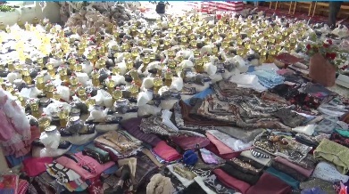 اهدای 350 بسته غذایی و لباس نو به نیازمندان بنابی