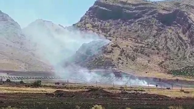 مهار آتش سوزی مراتع و مزارع منصور آباد در باشت